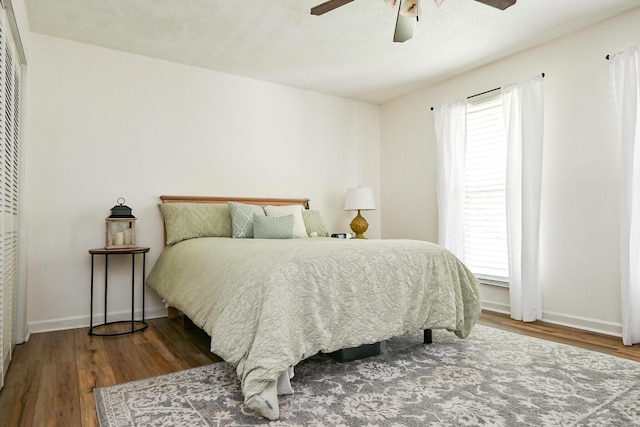 4901 Cindy Cir NW, Cleveland, TN 37312 - bedroom with wood finished floors, multiple windows, and a ceiling fan
