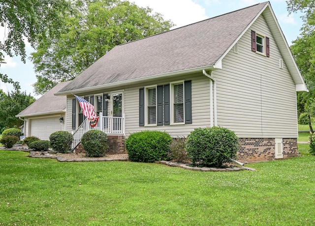 4901 Cindy Cir NW, Cleveland, TN 37312 - view of front facade with a front yard, a shingled roof, and an attached garage