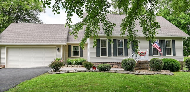 4901 Cindy Cir NW, Cleveland, TN 37312 - cape cod home with asphalt driveway, a garage, a front yard, and a shingled roof
