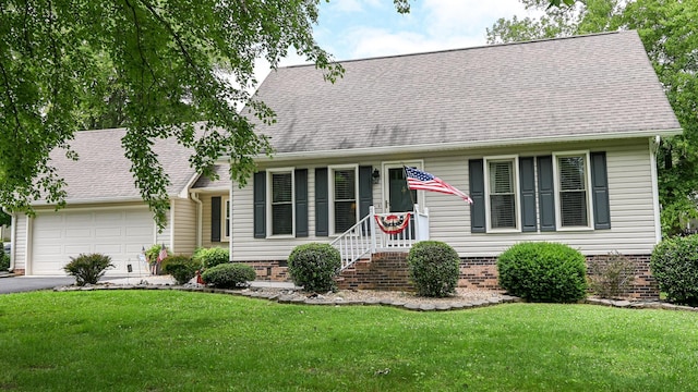 4901 Cindy Cir NW, Cleveland, TN 37312 - view of front facade featuring a garage, driveway, a front yard, and roof with shingles