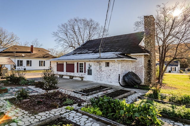 rear view of property with a patio