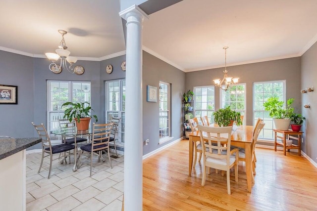 2036 Hickory Valley Rd, Chattanooga, TN 37421 - dining area with a chandelier, plenty of natural light, baseboards, crown molding, and light wood-style flooring