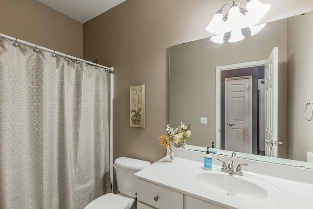 2036 Hickory Valley Rd, Chattanooga, TN 37421 - full bathroom featuring a chandelier, vanity, toilet, and a shower with shower curtain