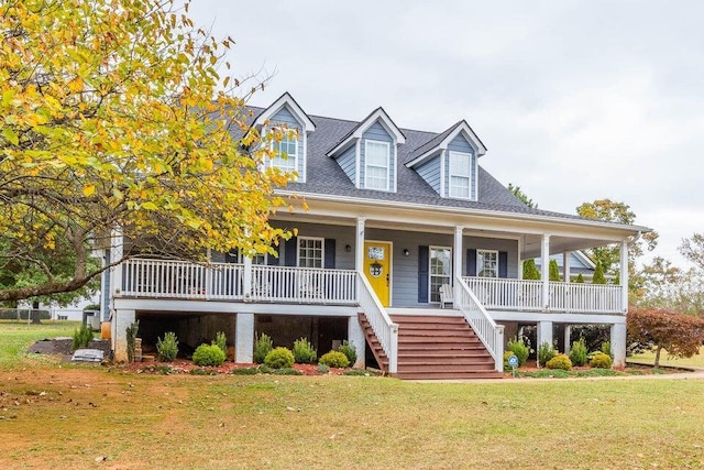 2036 Hickory Valley Rd, Chattanooga, TN 37421 - cape cod house featuring stairs, a front lawn, and a porch