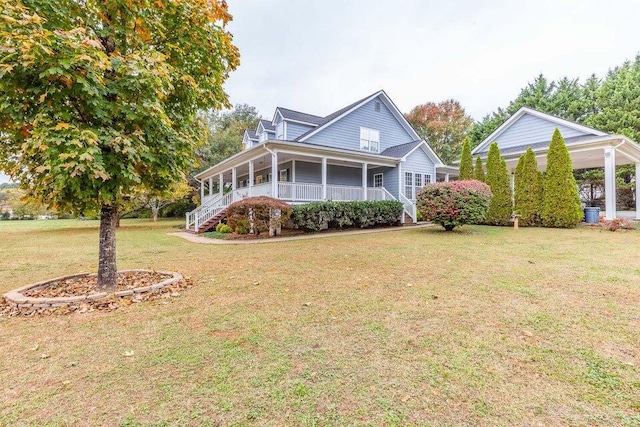 2036 Hickory Valley Rd, Chattanooga, TN 37421 - view of front of house with a front lawn and a porch