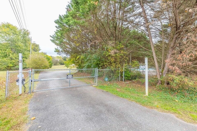 2036 Hickory Valley Rd, Chattanooga, TN 37421 - view of road with a gate and a gated entry