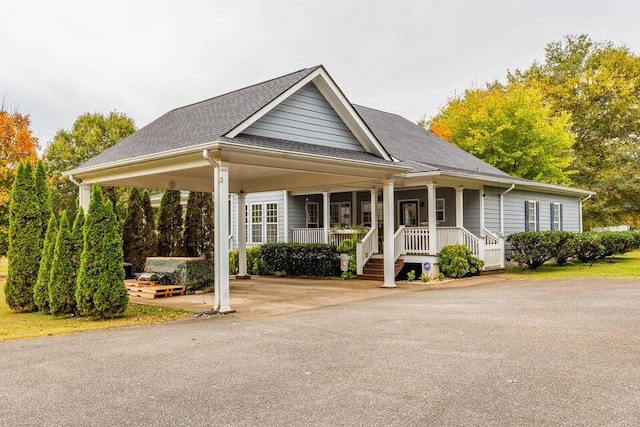 2036 Hickory Valley Rd, Chattanooga, TN 37421 - view of front of home with covered porch and a shingled roof