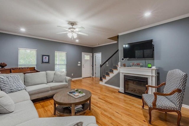 2036 Hickory Valley Rd, Chattanooga, TN 37421 - living area with wood finished floors, stairway, ceiling fan, crown molding, and recessed lighting