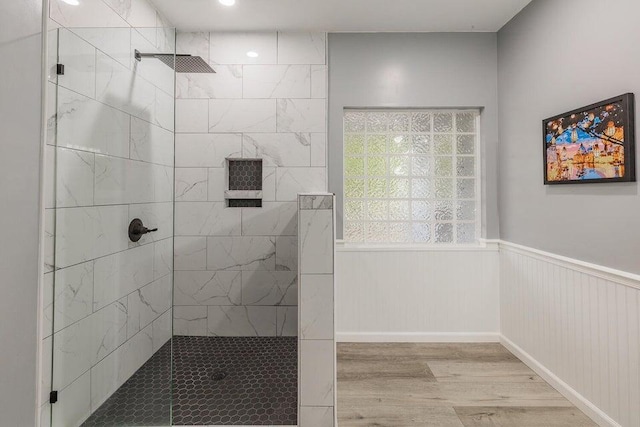 2036 Hickory Valley Rd, Chattanooga, TN 37421 - bathroom featuring a walk in shower, wood finished floors, and a wainscoted wall