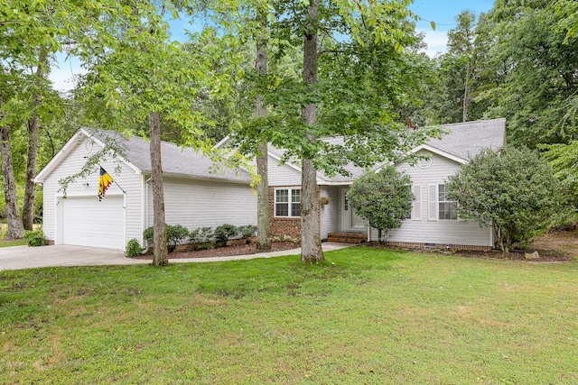 view of front of house featuring a garage and a front lawn