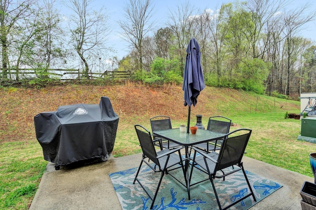 view of patio featuring grilling area and outdoor dining area