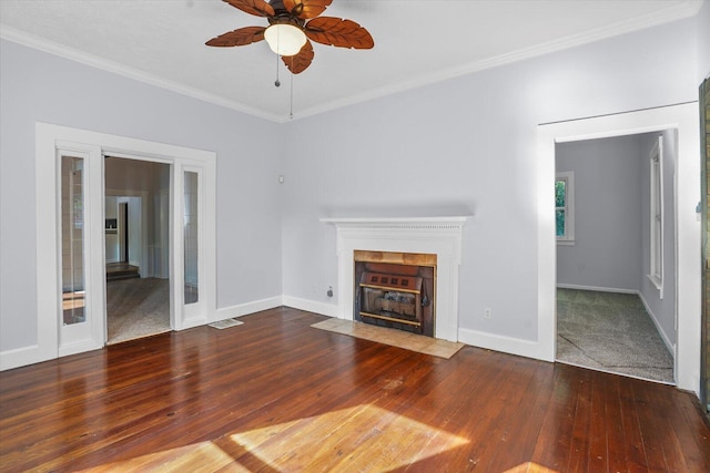 unfurnished living room with hardwood / wood-style flooring, ceiling fan, and ornamental molding