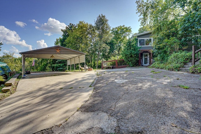 exterior space with a carport