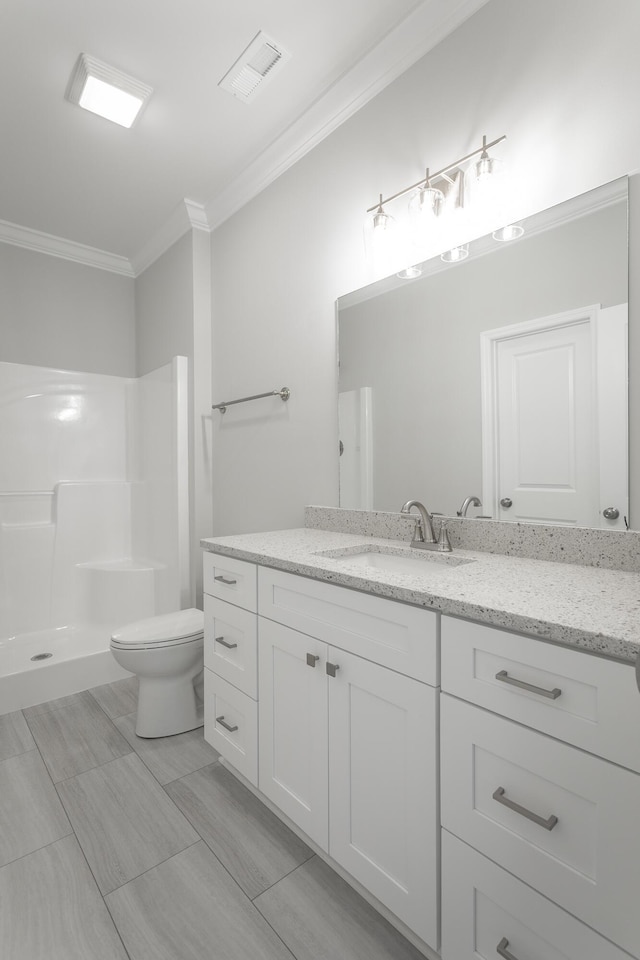 bathroom with vanity, toilet, walk in shower, and crown molding