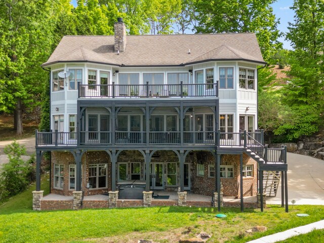 302 Key Cove Rd, Spring City, TN 37381 - rear view of house with a patio, a chimney, a yard, and a balcony