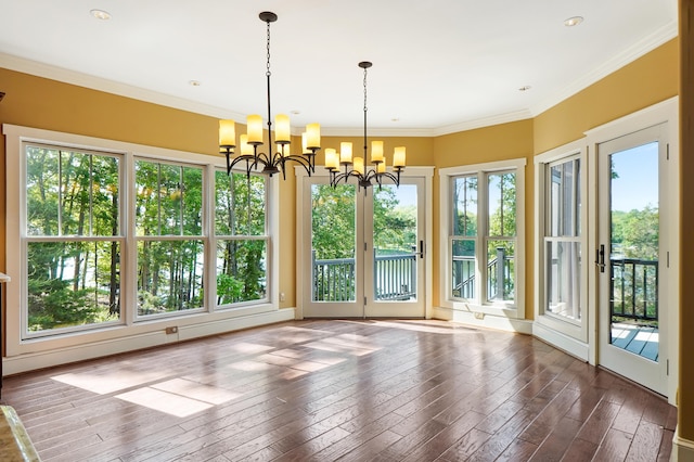 302 Key Cove Rd, Spring City, TN 37381 - unfurnished dining area featuring ornamental molding, hardwood / wood-style floors, and a notable chandelier