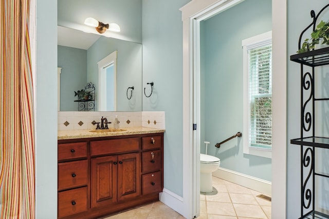 302 Key Cove Rd, Spring City, TN 37381 - bathroom with vanity, backsplash, tile patterned flooring, and toilet