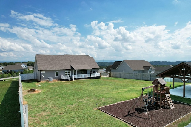 exterior space featuring a playground and a lawn