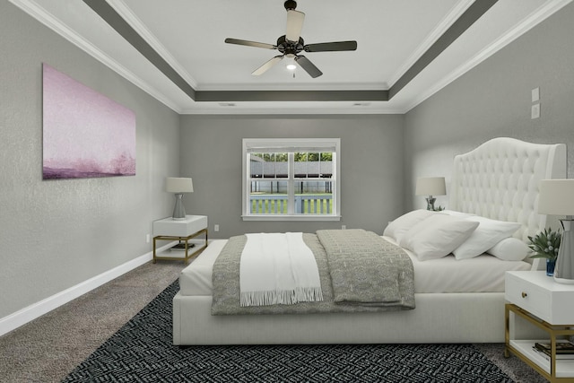 bedroom with a raised ceiling, crown molding, carpet, and ceiling fan