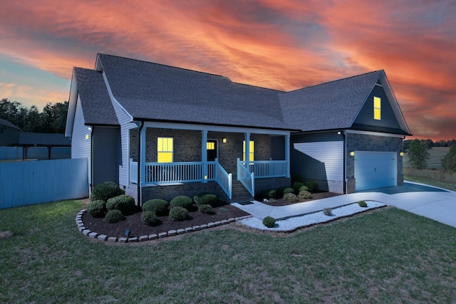 view of front of property with a yard and a porch