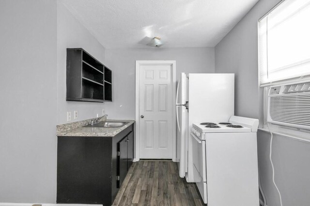 604 N Moore Rd, Chattanooga, TN 37411 - kitchen featuring electric range, dark wood finished floors, light countertops, dark cabinets, and open shelves