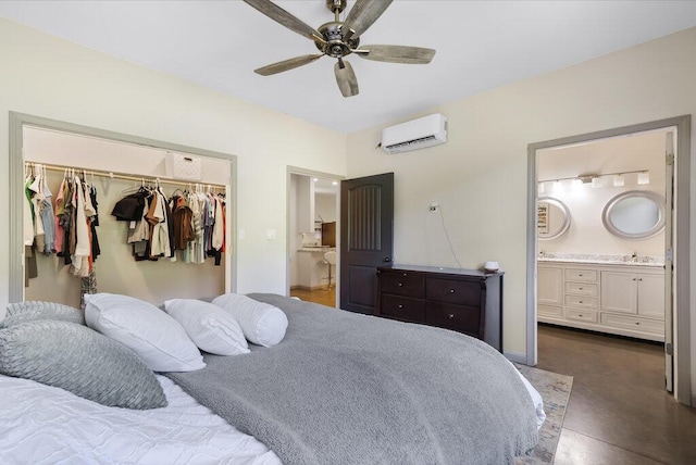 1295 Ideal Valley Rd, Spring City, TN 37381 - bedroom with a wall mounted AC, a closet, a spacious closet, connected bathroom, and a sink