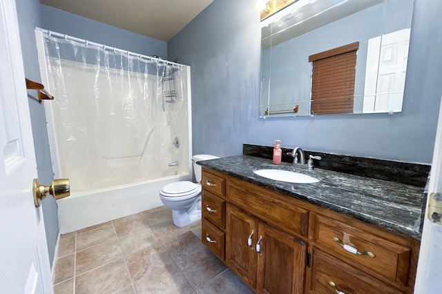 full bath featuring tile patterned flooring, shower / bath combination with curtain, toilet, and vanity