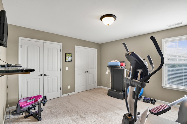 exercise room with carpet