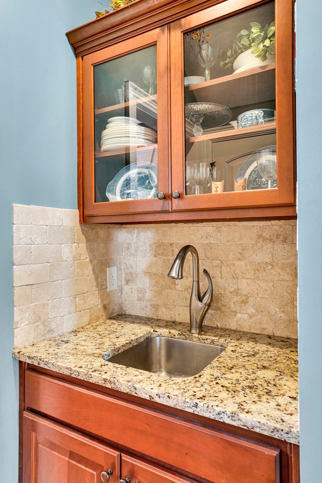 details featuring backsplash and sink