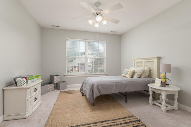 carpeted bedroom featuring ceiling fan