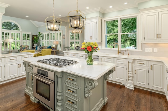 kitchen featuring a sink, white cabinetry, gray cabinetry, and stainless steel appliances