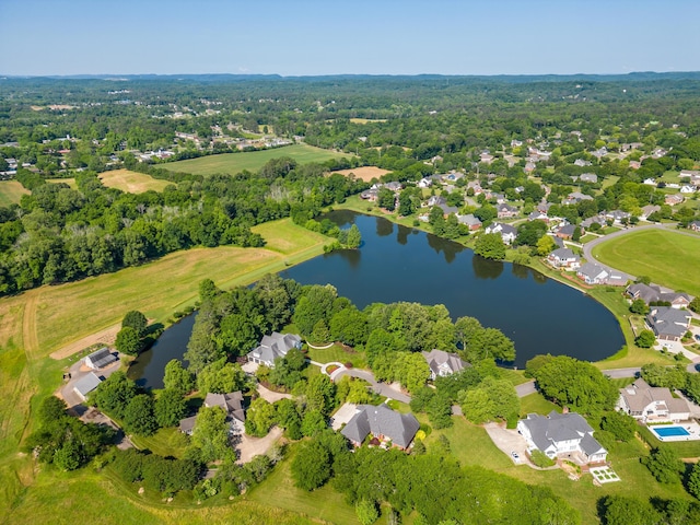 aerial view featuring a residential view and a water view