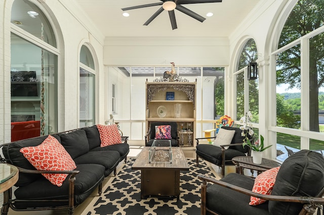 sunroom featuring recessed lighting, ornamental molding, and a wealth of natural light