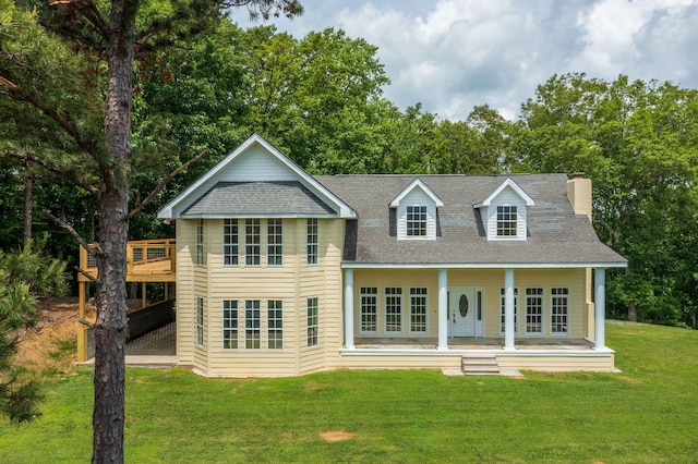 201 Payne Mountain Rd, Tellico Plains, TN 37385 - view of front of home with a front lawn, a shingled roof, a chimney, and covered porch