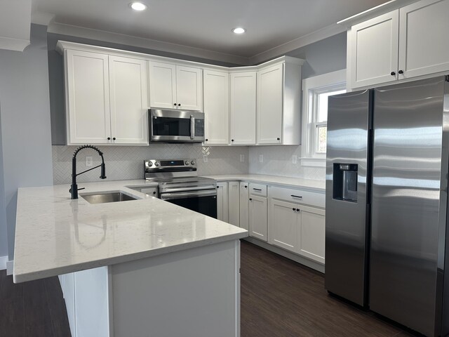 kitchen featuring white cabinets