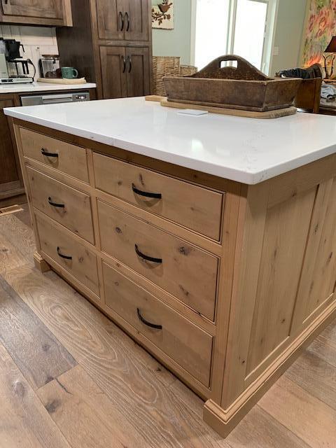 kitchen featuring light hardwood / wood-style flooring and a kitchen island