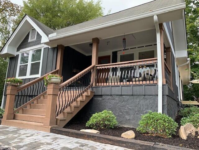 entrance to property with a porch