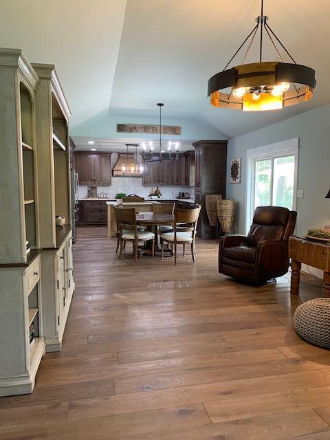 dining area with dark hardwood / wood-style flooring