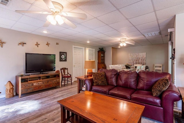 436 Oak Hills Drive Lots 4.5 & 6, Spring City, TN 37381 - living room with ceiling fan, wood finished floors, a drop ceiling, and baseboards