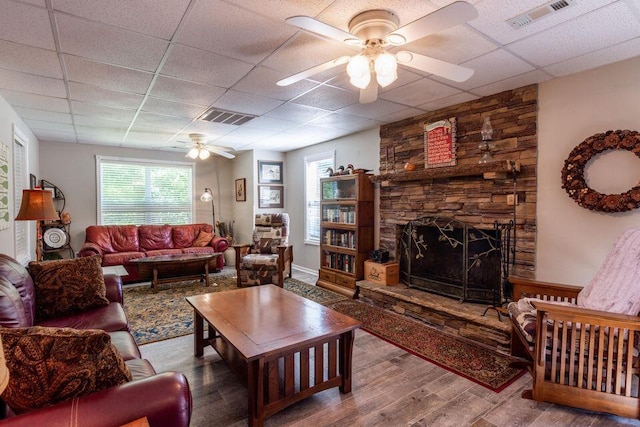 436 Oak Hills Drive Lots 4.5 & 6, Spring City, TN 37381 - living room with a drop ceiling, ceiling fan, wood finished floors, and a fireplace