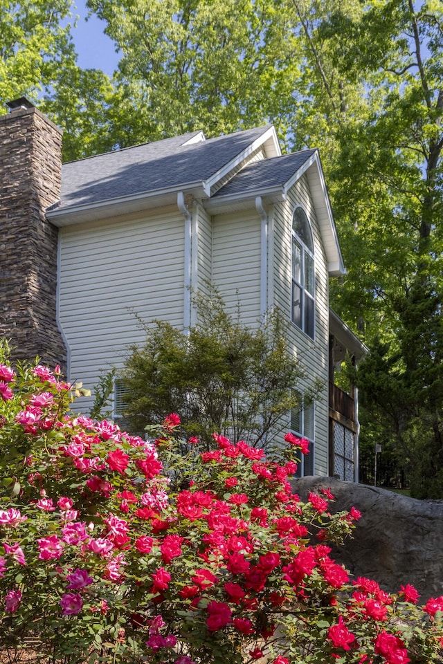 436 Oak Hills Drive Lots 4.5 & 6, Spring City, TN 37381 - view of side of property with a garage and a chimney