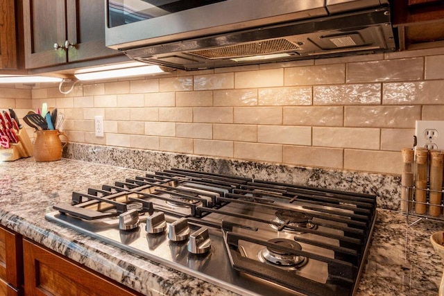 436 Oak Hills Drive Lots 4.5 & 6, Spring City, TN 37381 - kitchen view of appliances with stainless steel finishes, backsplash, and light stone counters