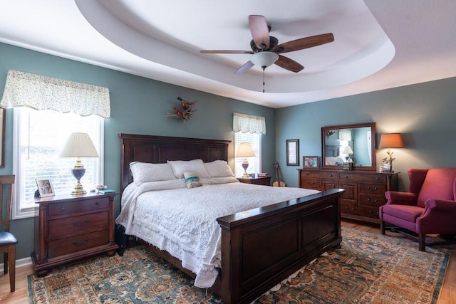436 Oak Hills Drive Lots 4.5 & 6, Spring City, TN 37381 - bedroom featuring wood finished floors, a raised ceiling, and a ceiling fan