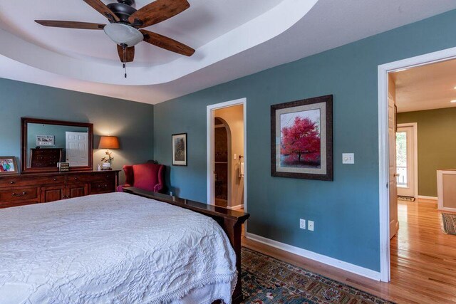436 Oak Hills Drive Lots 4.5 & 6, Spring City, TN 37381 - bedroom featuring wood finished floors, baseboards, and a tray ceiling