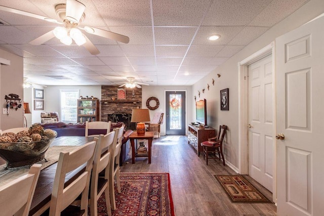 436 Oak Hills Drive Lots 4.5 & 6, Spring City, TN 37381 - dining room with a ceiling fan, a drop ceiling, wood finished floors, a stone fireplace, and recessed lighting