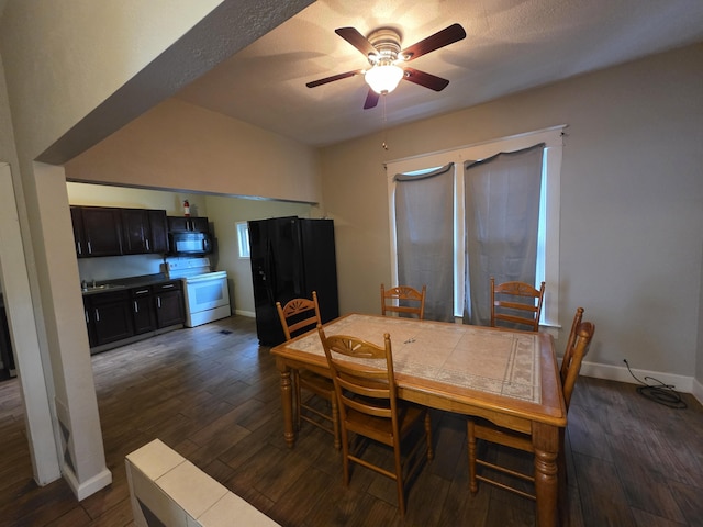 3817 Kirkland Ave, Chattanooga, TN 37410 - dining space featuring a ceiling fan and dark wood-style floors