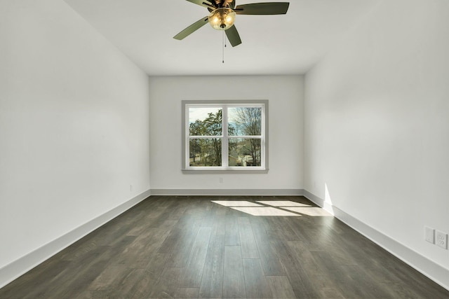 164 Mcnabb Dr, Cleveland, TN 37312 - unfurnished room featuring a ceiling fan, dark wood-style floors, and baseboards