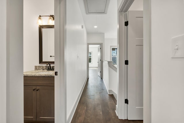 164 Mcnabb Dr, Cleveland, TN 37312 - hallway with dark wood-style flooring, attic access, baseboards, and a sink
