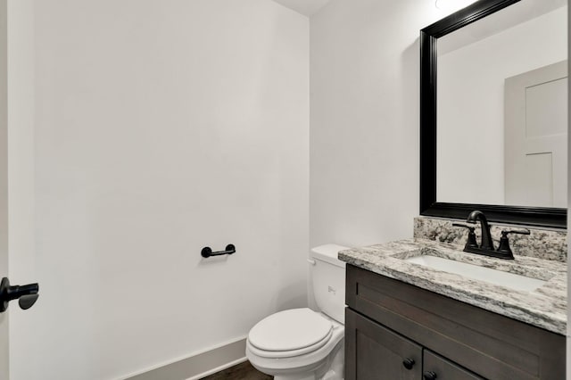 164 Mcnabb Dr, Cleveland, TN 37312 - half bath featuring toilet, vanity, and baseboards