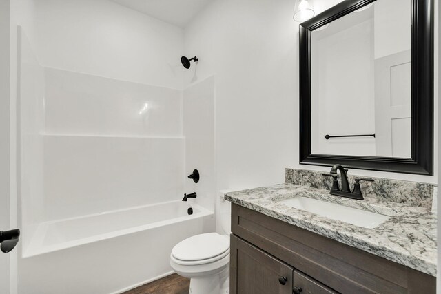 164 Mcnabb Dr, Cleveland, TN 37312 - bathroom featuring vanity, toilet, and shower / bathtub combination